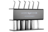Tweezer stand holds up to six eyelash extension tweezers and keeps lash artists organized.  We recommend cleaning your tweezers before storing them.